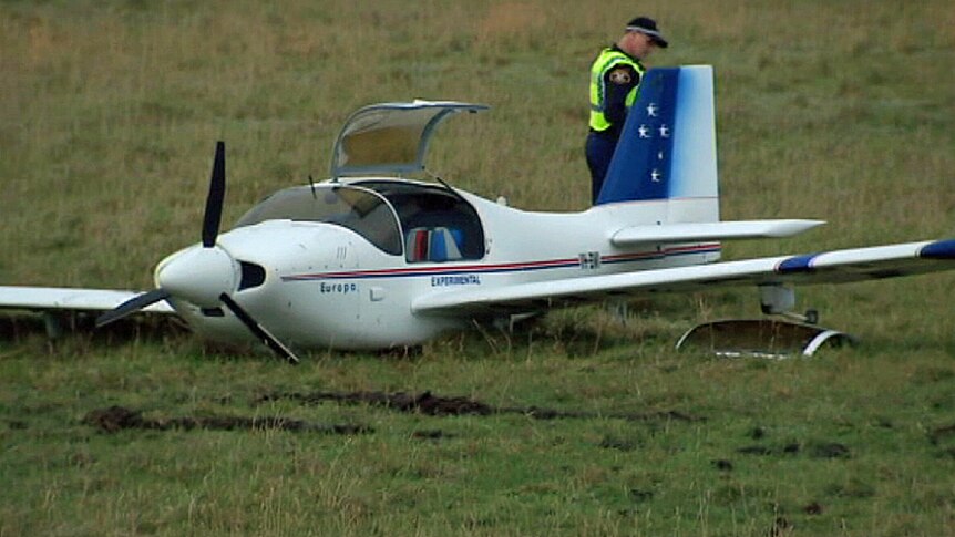 A light plane lies in a paddock in northern Tasmania
