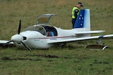 A light plane lies in a paddock in northern Tasmania