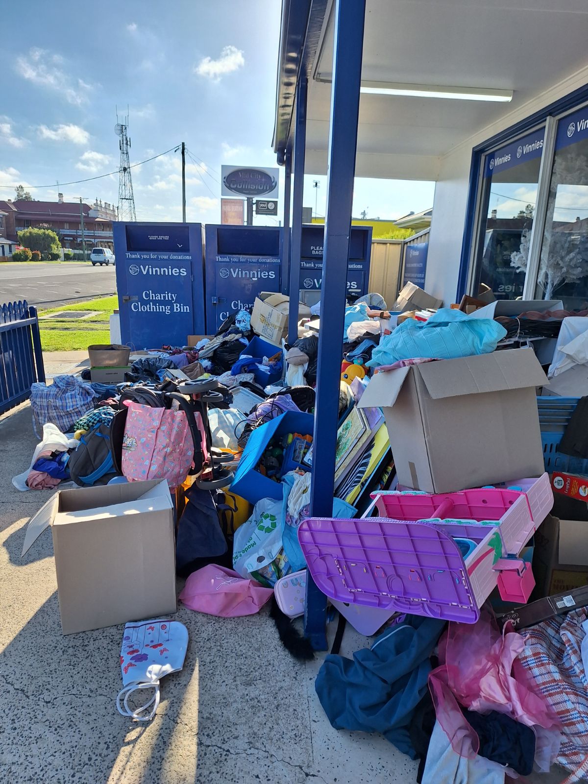 Boxes and clothes left outside a charity store in Warwick, Queensland