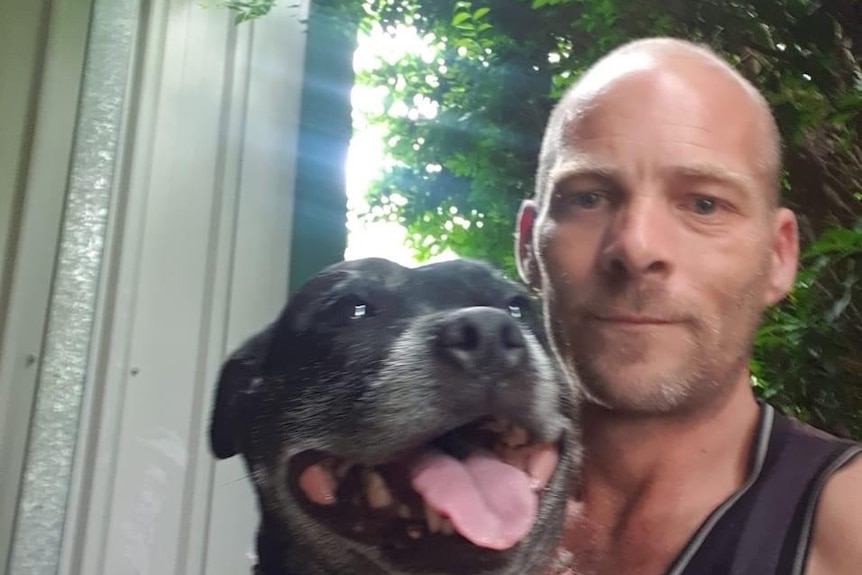 Robert Alan Gee, who has been charged with the murder of five-month-old Michael Willmott, in June 2021 in selfie with dog