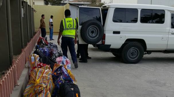 Refugees and asylum seekers arriving at the motel in Port Moresby.