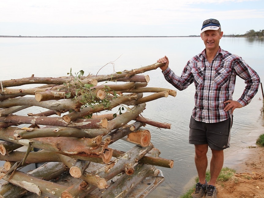 Red gum fish hotel ready to be dropped into the local lake