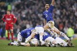 Tim Cahill and team-mates celebrate v Liverpool