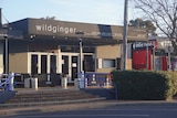 Wildginger restaurant with its doors closed on the main street of Huskisson.