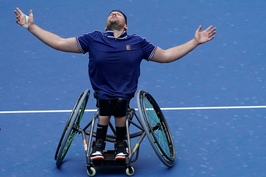 Dylan Alcott celebrates his US Open win