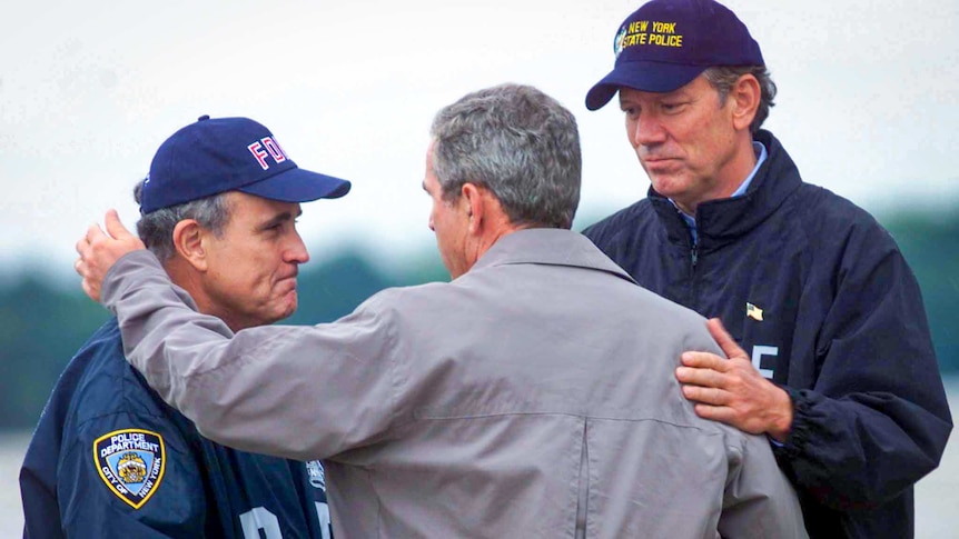 George W Bush embraces Rudy Giuliani