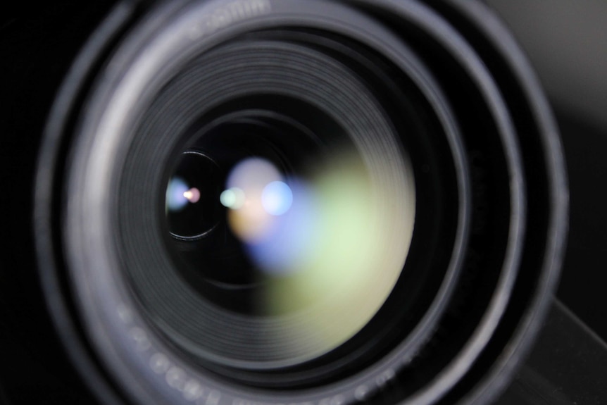 A close up of a camera lens.