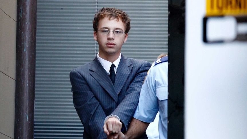 Daniel Kelsall is led to a Corrective Services prison van as he leave the NSW Supreme Court in Sydney