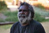 Aboriginal man looking worried