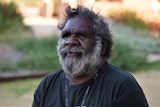 Aboriginal man looking worried