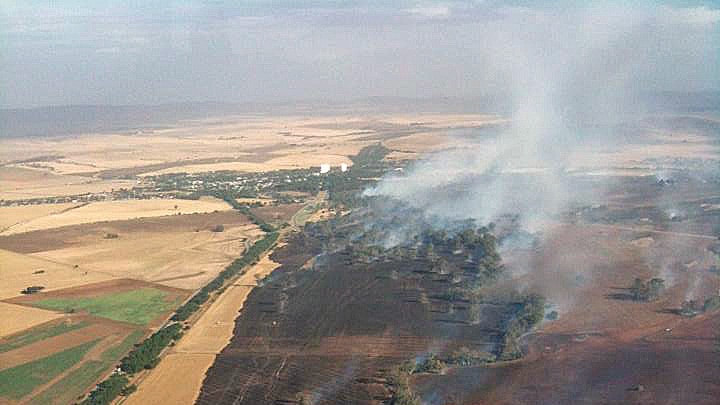 The bushfire went close to the town of Gladstone (at rear)