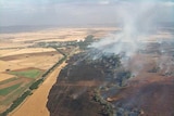 The bushfire went close to the town of Gladstone (at rear)