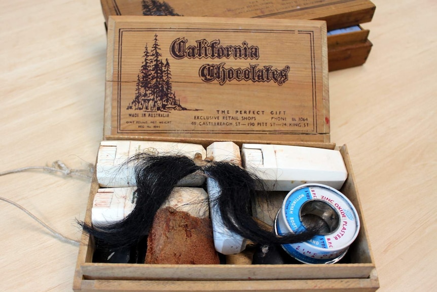Charles 'Bud' Tingwell's fake moustache in his makeup kit in the collection of the National Film and Sound Archive.