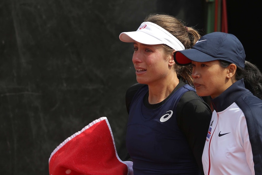 Johanna Konta cries during a Fed Cup match