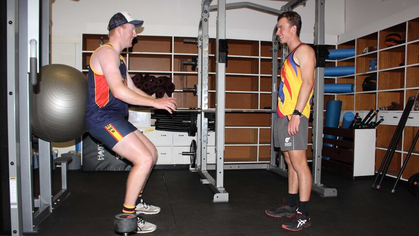 Oaklands Fit Farmer participant Zac Kerr and trainer George Sandral.