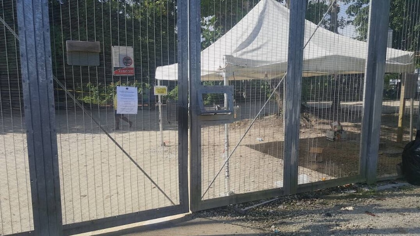 Gates at the Manus Island detention centre, which looks deserted.