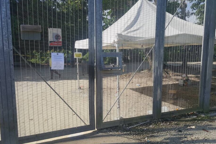 Gates at the Manus Island detention centre, which looks deserted.