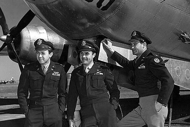 The crew of the B-29 bomber Enola Gay (L-R) navigator Major Theodore Van Kirk, pilot Colonel Paul Tibbets and bombardier Major Thomas Ferebee after dropping the first atomic bomb on Hiroshima on August 6, 1945