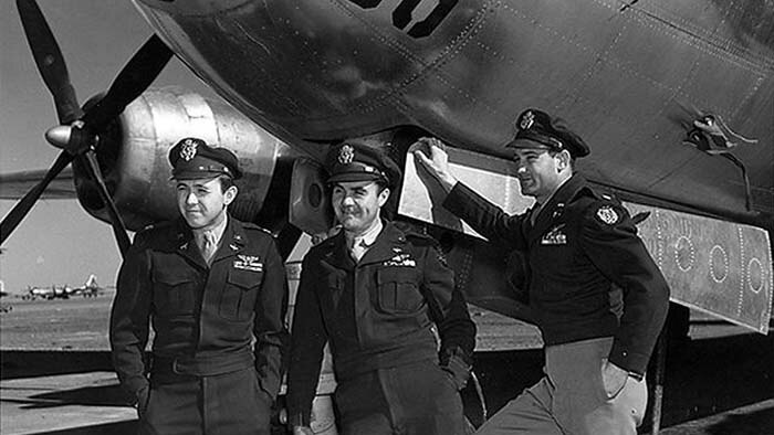 The crew of the B-29 bomber Enola Gay (L-R) navigator Major Theodore Van Kirk, pilot Colonel Paul Tibbets and bombardier Major Thomas Ferebee after dropping the first atomic bomb on Hiroshima on August 6, 1945