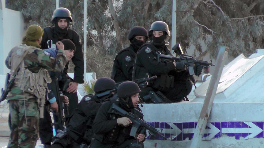 Tunisian special forces take position during clashes with militants.