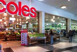 Coles supermarket with apples out the front