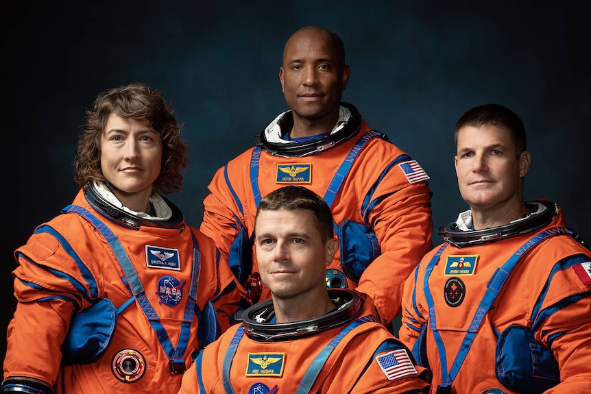 A photo of four astronauts. Three of them are men, one of them is a woman. And one of them is a person of colour.