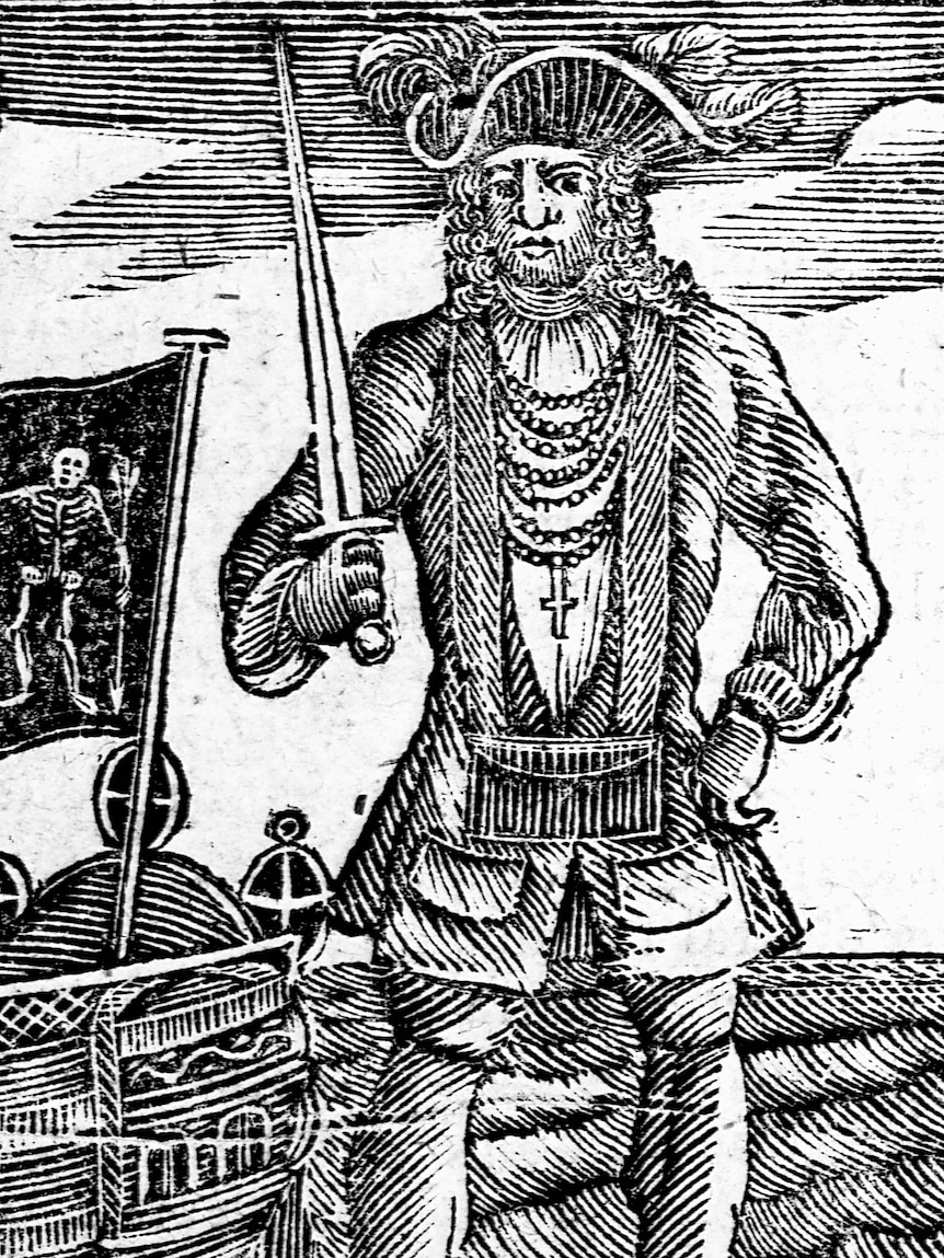 An illustration of a pirate, standing next to his ship, with a Jolly Roger