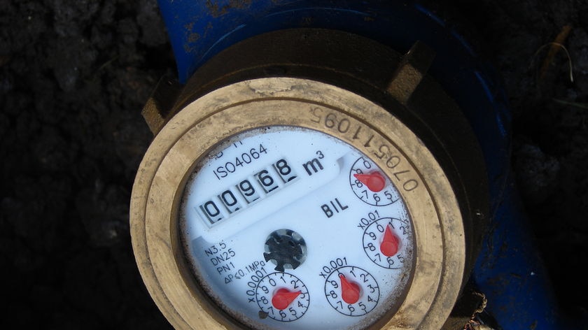A close up photo of a water meter.