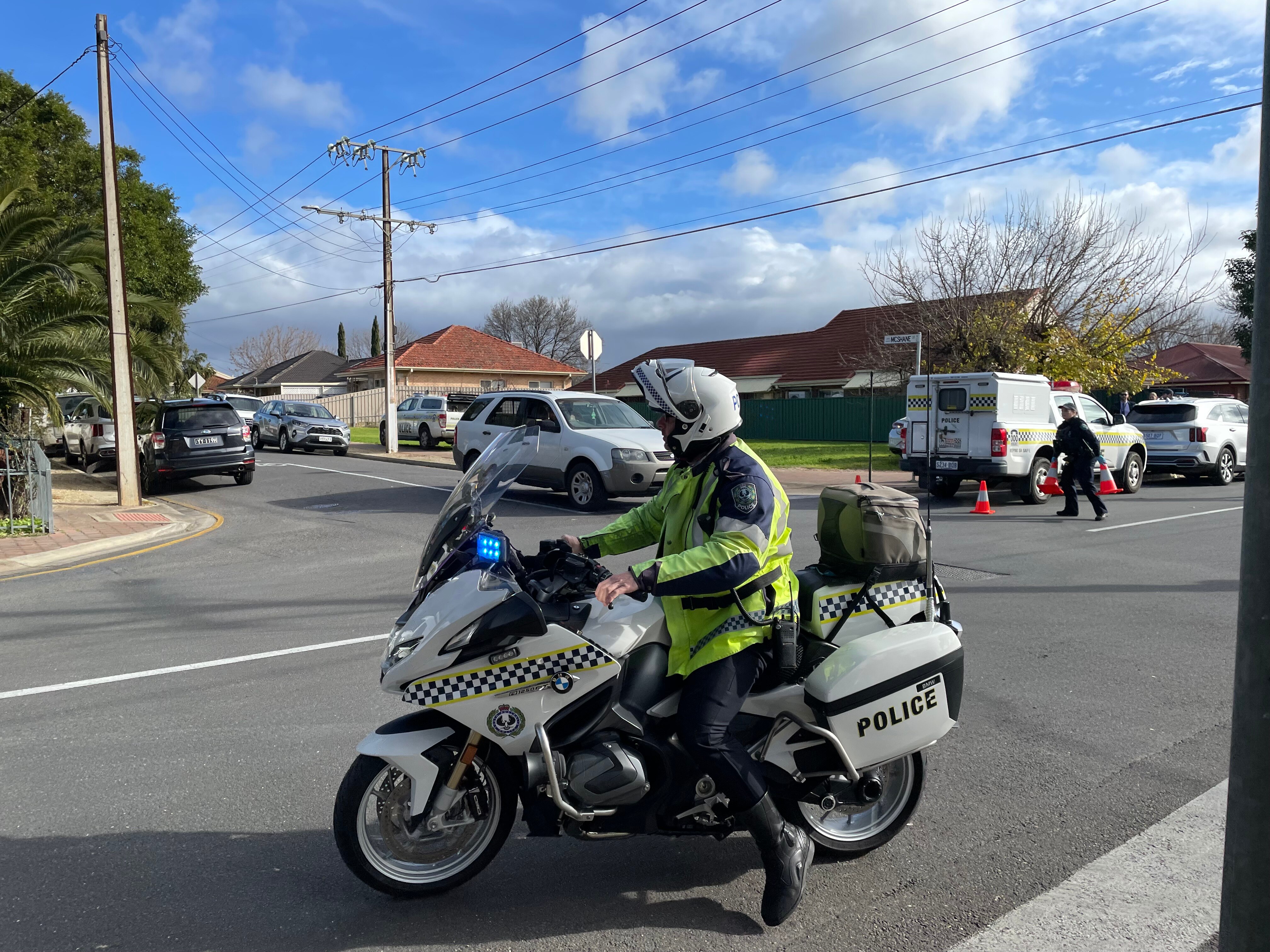 A police officer on a motorbike.