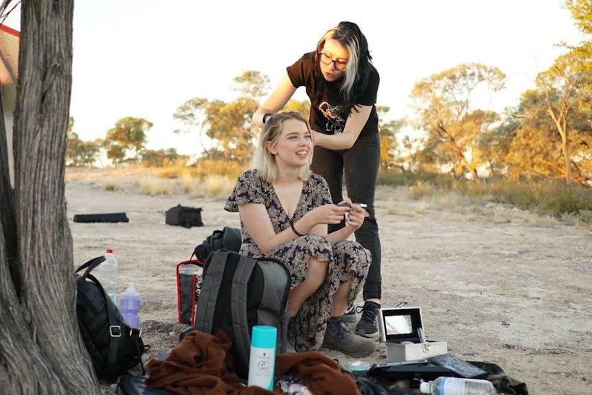 Students do make-up for film shoot at Winton in south-west Queensland