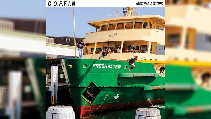 The members of Sydney band C.O.F.F.I.N. leap into the water from a green/beige Freshwater Ferry docked at the pier 