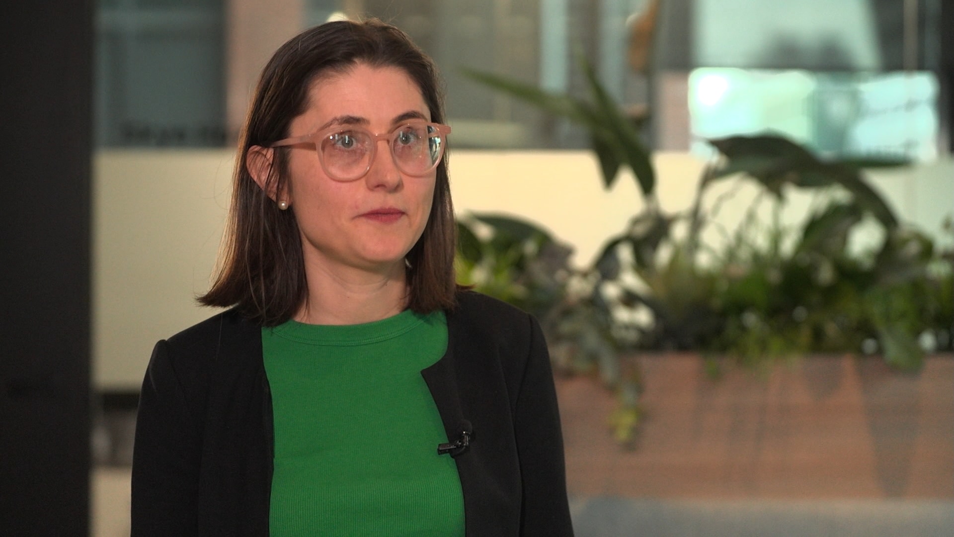 Mortgage Stress Victoria CEO Nadia Harrison wears a green top and black jacket