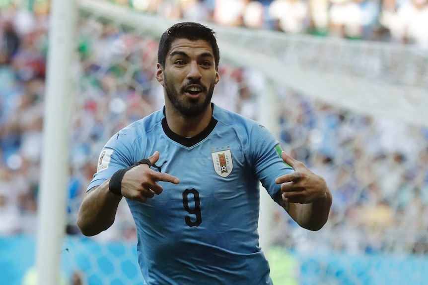 Uruguay's Luis Suarez celebrates scoring a goal
