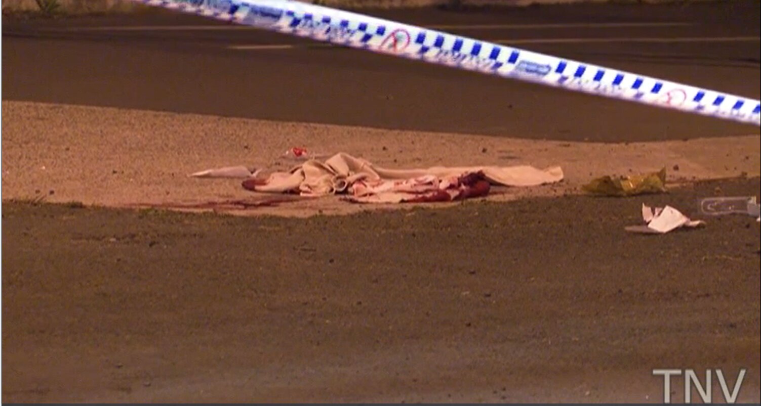 A bloody rag left lying on the footpath