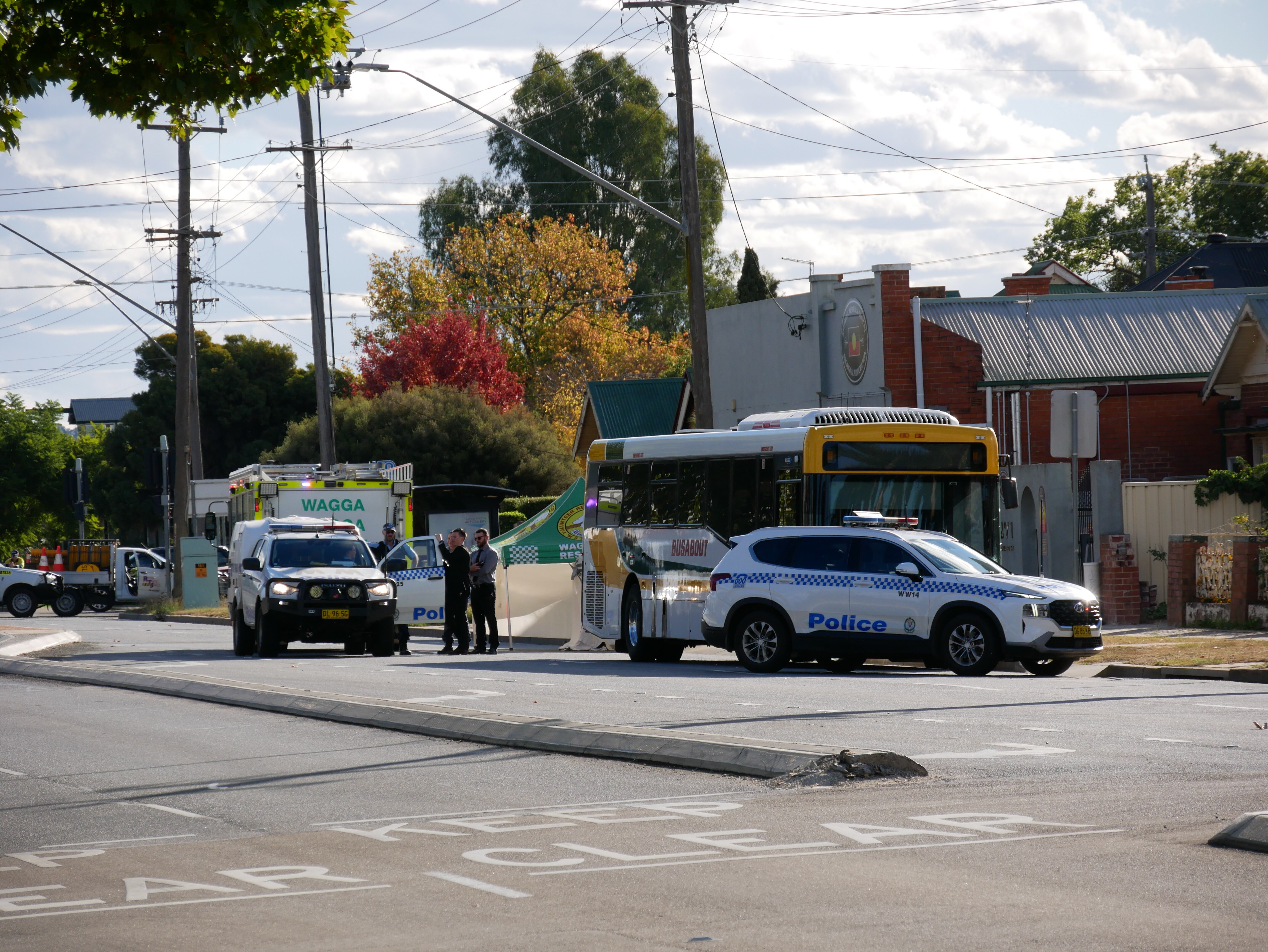 Emergency services on scene after a man was killed in a bus collision at Wagga Wagga on Sunday.