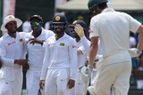 Sri Lanka celebrates as Moises Henriques departs field