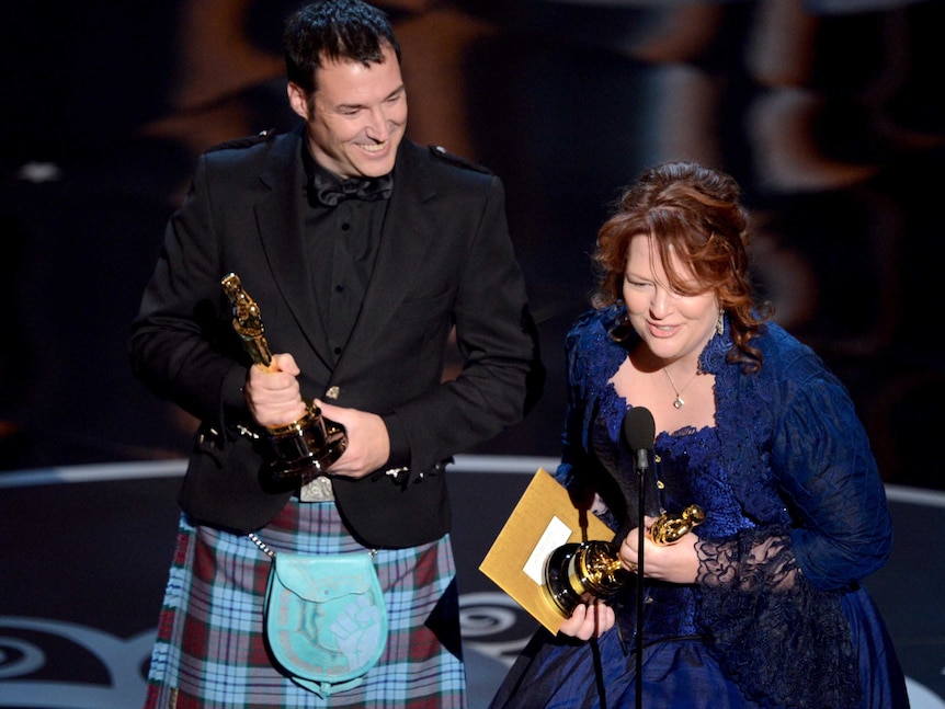 Mark Andrews and Brenda Chapman with their Oscars.