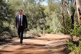 Nationals MP Andrew Broad walks the grounds of Parliament House in Canberra.