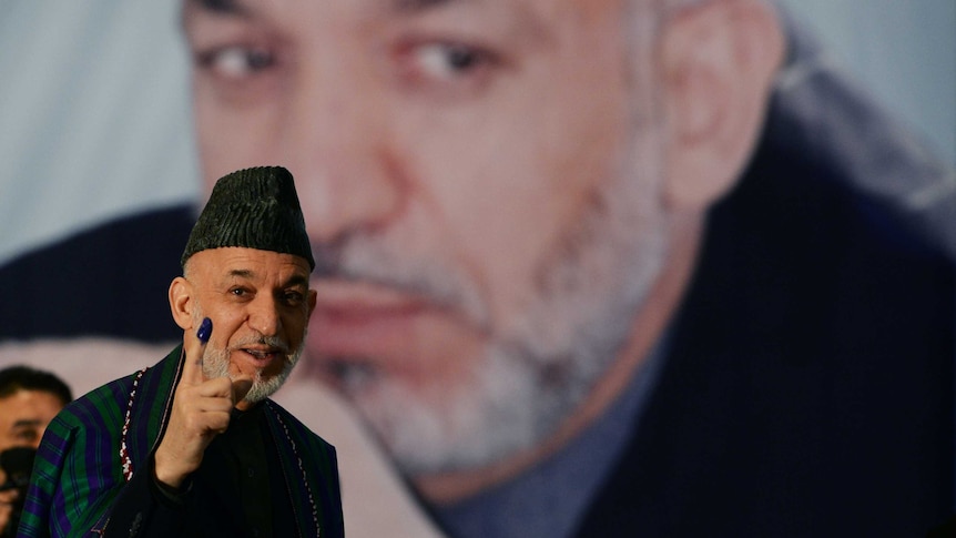 Afghanistan's outgoing president Hamid Karzai's cousin was killed by a suicide attacker.