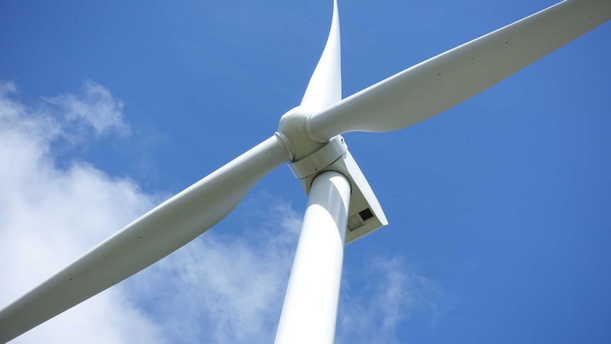 A shot of a wind turbine from below.