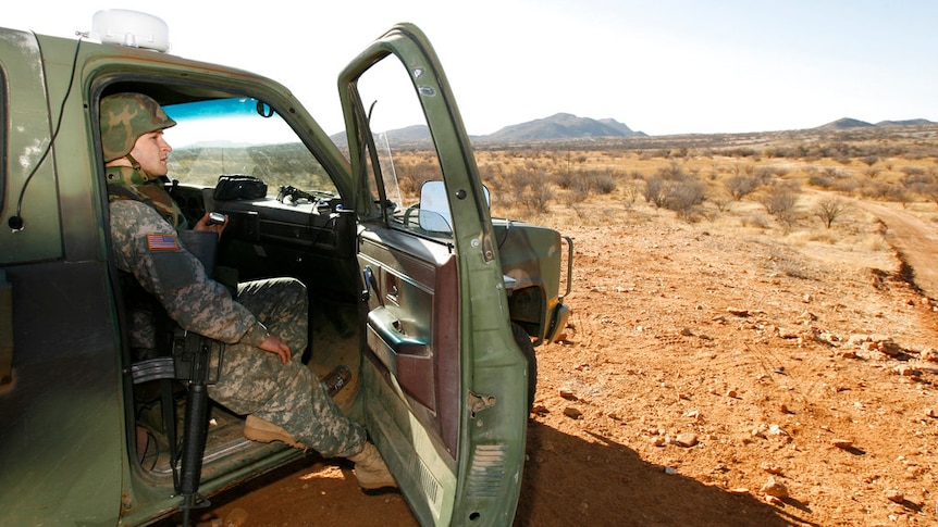 A member of the US National Guard patrols the Arizona-Mexico border in Sasabe, Arizona.