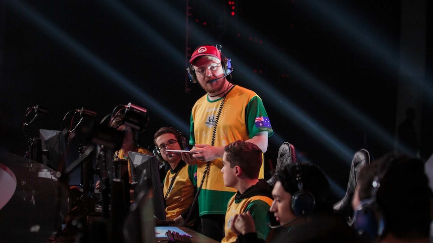 Australian Overwatch player Jordan 'Gunba'  Graham on stage at the Overwatch World Cup group stage in Thailand
