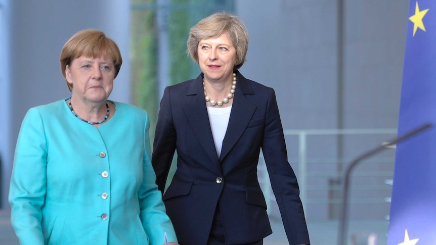 Angela Merkel and Theresa May.