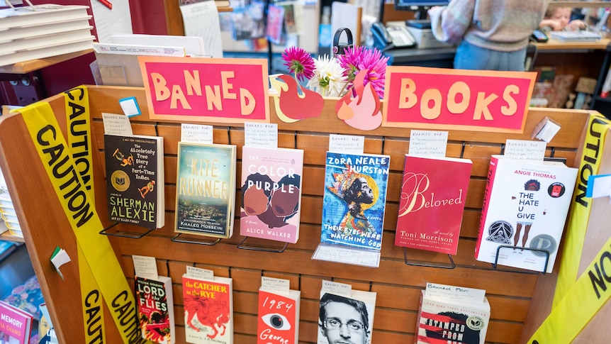 A display of banned books in the US. Includes The Colour Purple, Catcher in The Rye