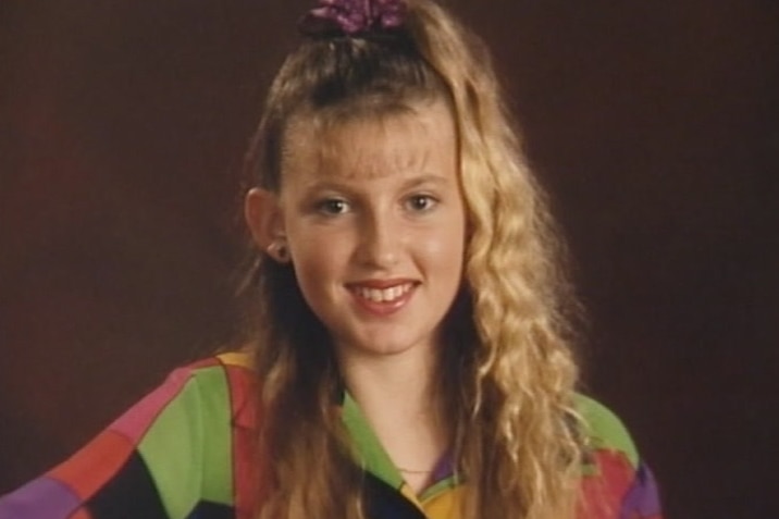 Rhianna Barreau wearing a colourful top and smiling