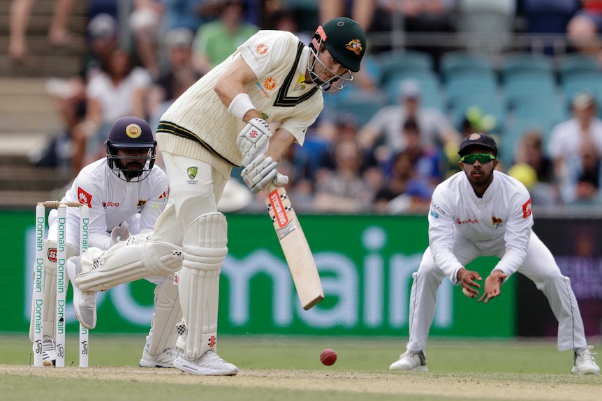 Kurtis Patterson watches the ball intently as he plays through the leg side. Keep and slips fielder look on.