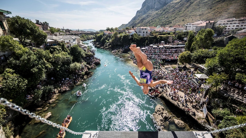 Rhiannan Iffland of Australia dives from the 21.5 metre platform on Stari Most.