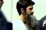 APEC stunt: Chas Licciardello was dressed as Osama bin Laden.