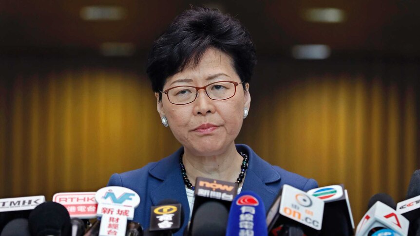 Hong Kong Chief Executive Carrie Lam listens to reporters' questions during a press conference.