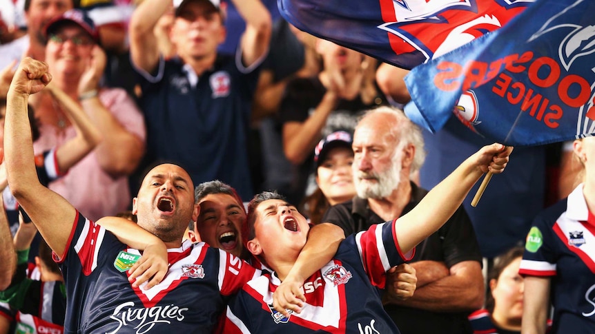 Roosters fans celebrate